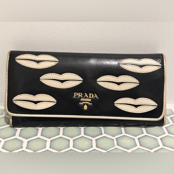 Prada Handbags - Prada Black Leather Trifold Continental Wallet with White Lip Appliques